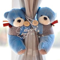 Um par de urso para amarrar  na cortina Azul